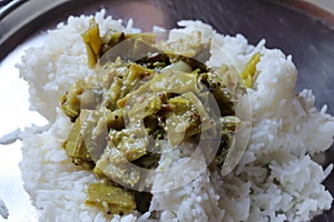 Fresh Ridge gourd curry and rice isolated on white background