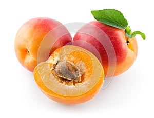 Fresh ripe apricot and a half. Fruit with leaf isolated on white background