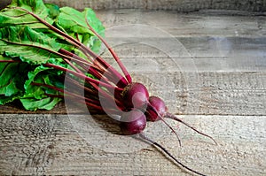 Fresh Ripe Beet on Old Wooden Background. Organic Food. Copy Space For Your Text