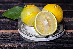 Fresh ripe bergamot orange fruits, fragrant citrus used in earl grey tea, medicine and spa treatments