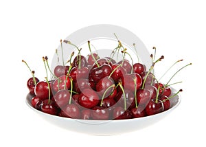 Fresh ripe bing cherries in bowl, isolated