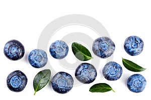 Fresh ripe blueberry with leaf isolated on white background with copy space for your text. Top view. Flat lay pattern