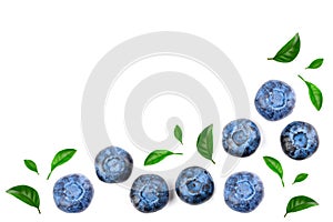 Fresh ripe blueberry with leaf isolated on white background with copy space for your text. Top view. Flat lay pattern