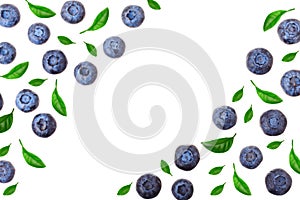 Fresh ripe blueberry with leaf isolated on white background with copy space for your text. Top view. Flat lay pattern