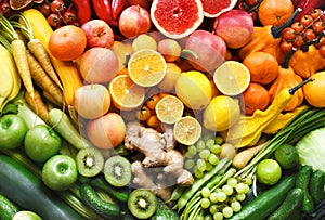 Fresh ripe bright colorful fruits and vegetables from market, summer farm harvest background, fruit rainbow