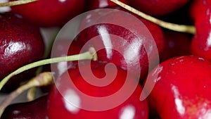 Fresh ripe cherry close-up. Fresh juicy wet red cherry rotation.