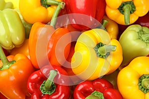 Fresh ripe colorful bell peppers as , top view