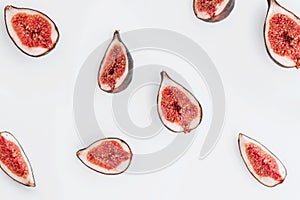 Fresh ripe figs on white background. Top view