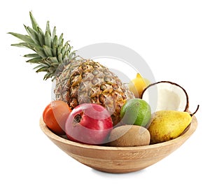 Fresh ripe fruits in wooden bowl on white background