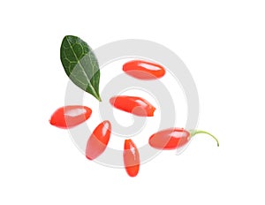 Fresh ripe goji berries and leaf on white background