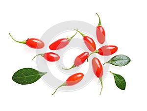 Fresh ripe goji berries and leaves on white background