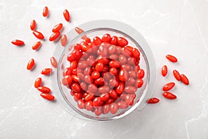 Fresh ripe goji berries on marble table