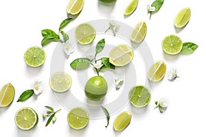 Fresh ripe green limes on white background, top view