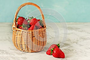 Fresh Ripe Harvest Strawberries in Wicker Basket