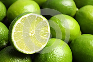 Fresh ripe juicy limes as background