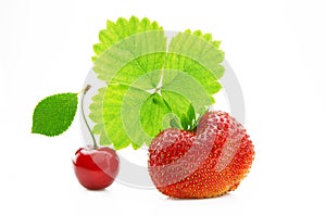 Fresh, ripe, juicy and mouth-watering strawberries with green leaves