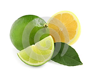 Fresh ripe lemon, limes and green leaf on white background