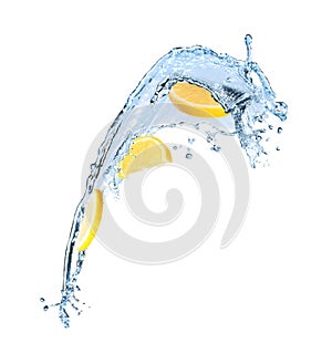 Fresh ripe lemon and splashing water on white background