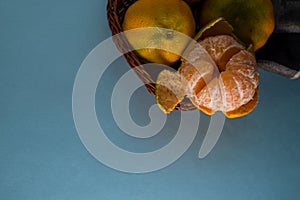Fresh ripe mandarins isolated on blue background