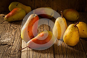 Fresh ripe organic pears on a wooden table
