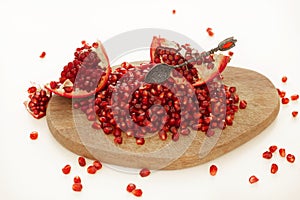 Fresh ripe pomegranate isolated on white background