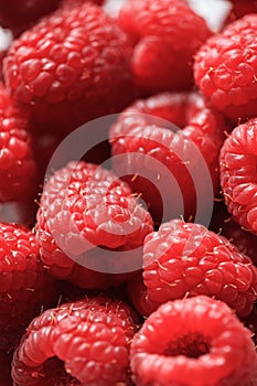 Fresh ripe red raspberries background