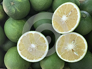 Fresh ripe sweet oranges which cut in a half