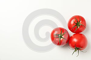 Fresh ripe tomatoes on white background top view