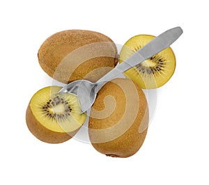 Fresh ripe yellow kiwis with spoon on white background, top view