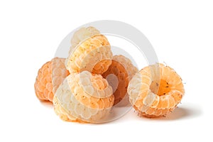 Fresh ripe yellow raspberries on a white background