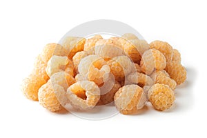 Fresh ripe yellow raspberries on a white background. Yellow raspberries, Berry harvest, Ripe delicious raspberries for desserts.