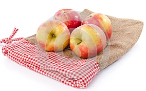 Fresh royal gala apples on a burlap bag
