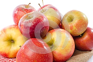 Fresh royal gala apples on a burlap bag