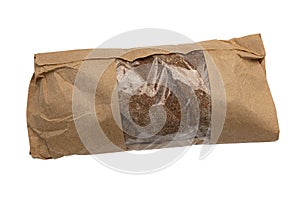 fresh rye bread in paper package isolated on white background, top view