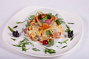 Fresh salad assorted with mushrooms, vegetables, meat, greens and cheese