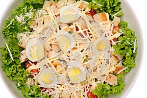 Fresh salad with chicken breast, cheese and eggs