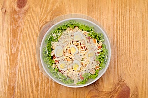 Fresh salad with chicken breast, cheese and eggs