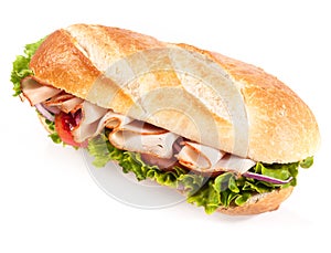 Fresh salad with chicken on a crusty baguette