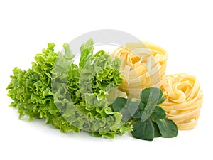 Fresh salad, lettuce leaves and macaroni