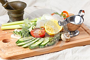 Fresh salad mix, sliced vegetables, olive oil and spices