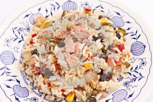 A fresh salad with rice, vegetables and tuna