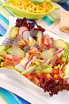 Fresh salad with seafood and vegetables