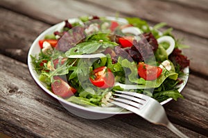 Fresh salad with tomato and cucumber.green