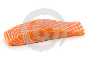 Fresh salmon fillet with basil on the white background.