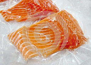 Fresh salmon in packing on ice.