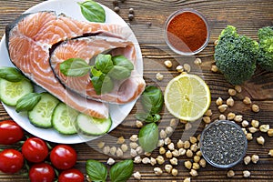 Fresh salmon on rustic wooden background