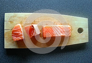 Fresh salmon on the table, food ingredients, fish, orange