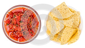 Fresh salsa dip and Corn chips, nachos in bowl isolated on white background. Recipe: tomatoes, onions, cilantro, hot jalapeno pepp