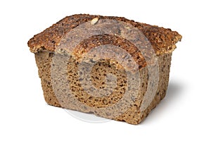 Fresh Scandinavian loaf of sourdough spelt bread close up on a white background