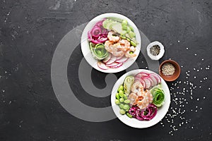 Fresh seafood recipe. Shrimp poke bowl with fresh prawn, brown rice, cucumber, pickled sweet onion, radish, soy beans